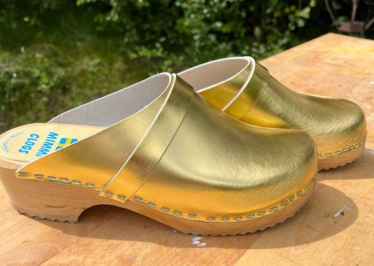 Guld tofflor - utgående modell